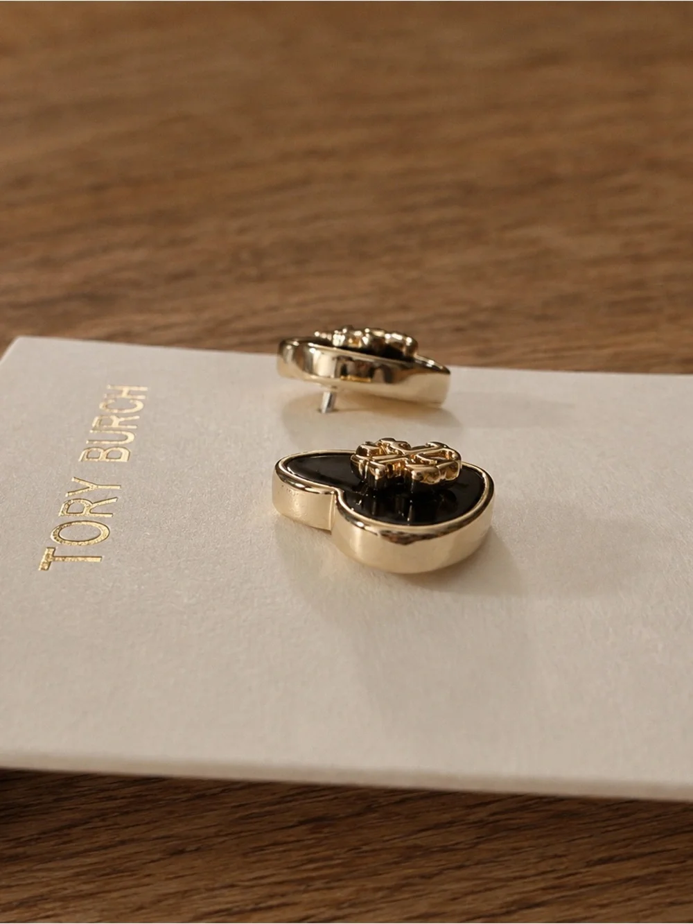 Tory Burch Black and Gold Heart Logo Stud Earrings